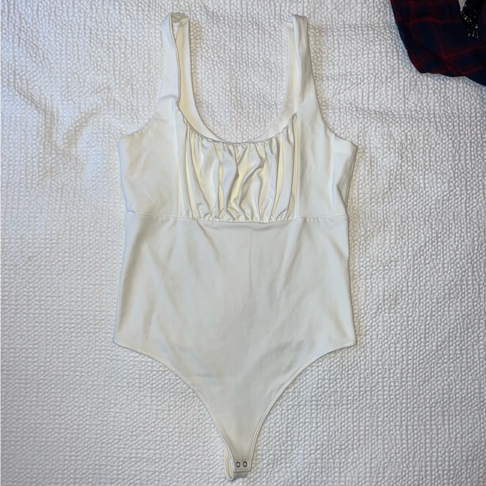 White bodysuit with pinch top